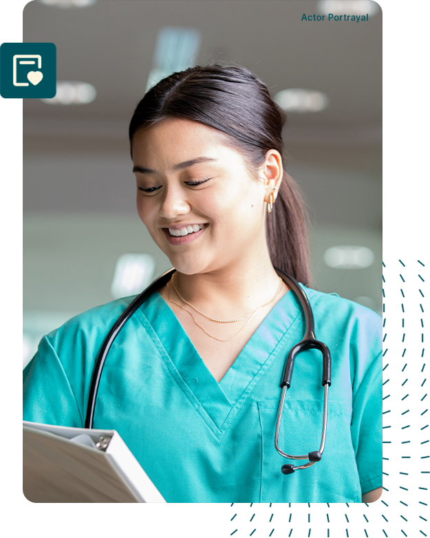 Actor Portrayal; A young Southeast Asian woman doctor smiling warmly and looking at binder ready to answer any medical questions with empathy.